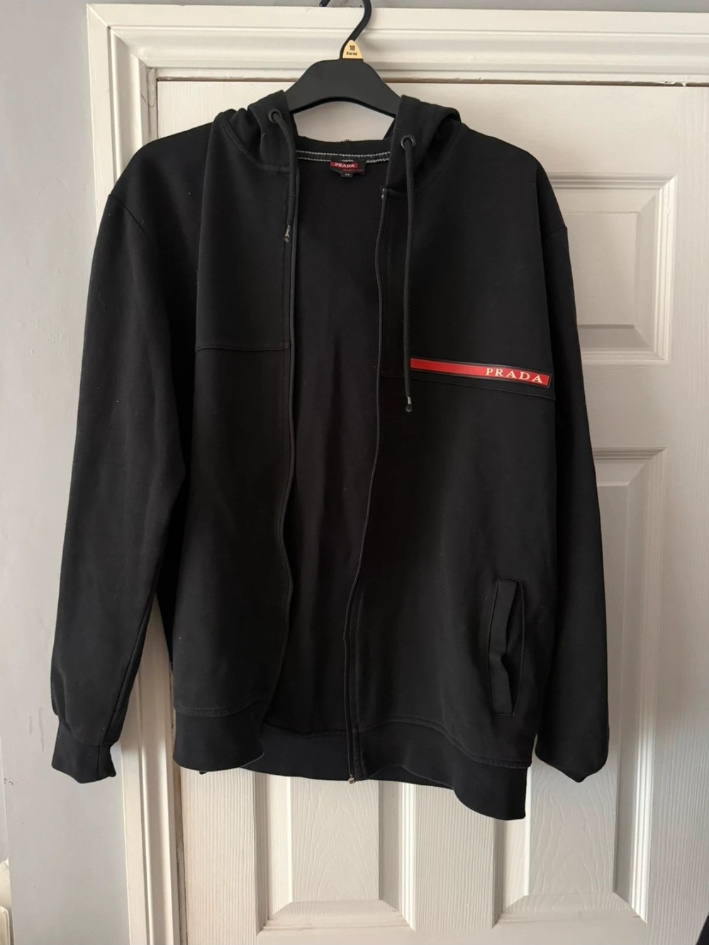 Prada Black Hooded Zip-Up Sweatshirt with Red Logo Stripe